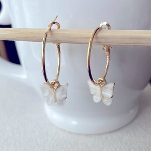 Gold hoops + white butterfly earrings